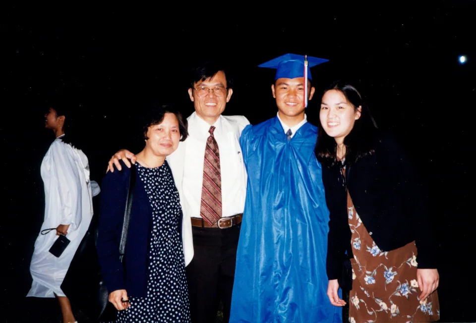 Angell’s high-school graduation, 1998: Esther, David, Angell and Sunny. Identified by Angell.