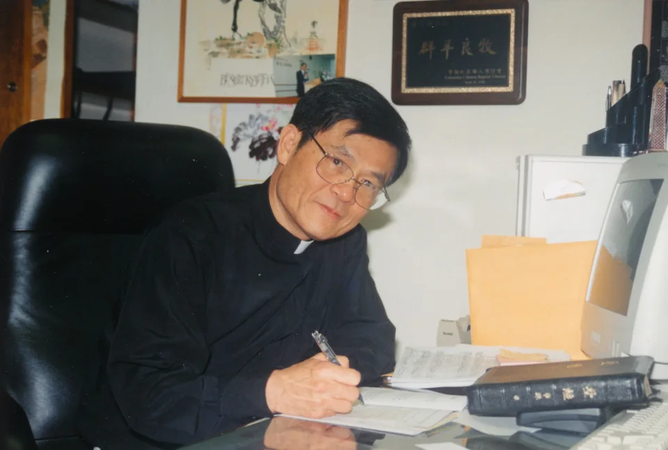 A desk at OCM Boon Church in Flushing; the back of the print reads “Boon church of OCM, 2000.”