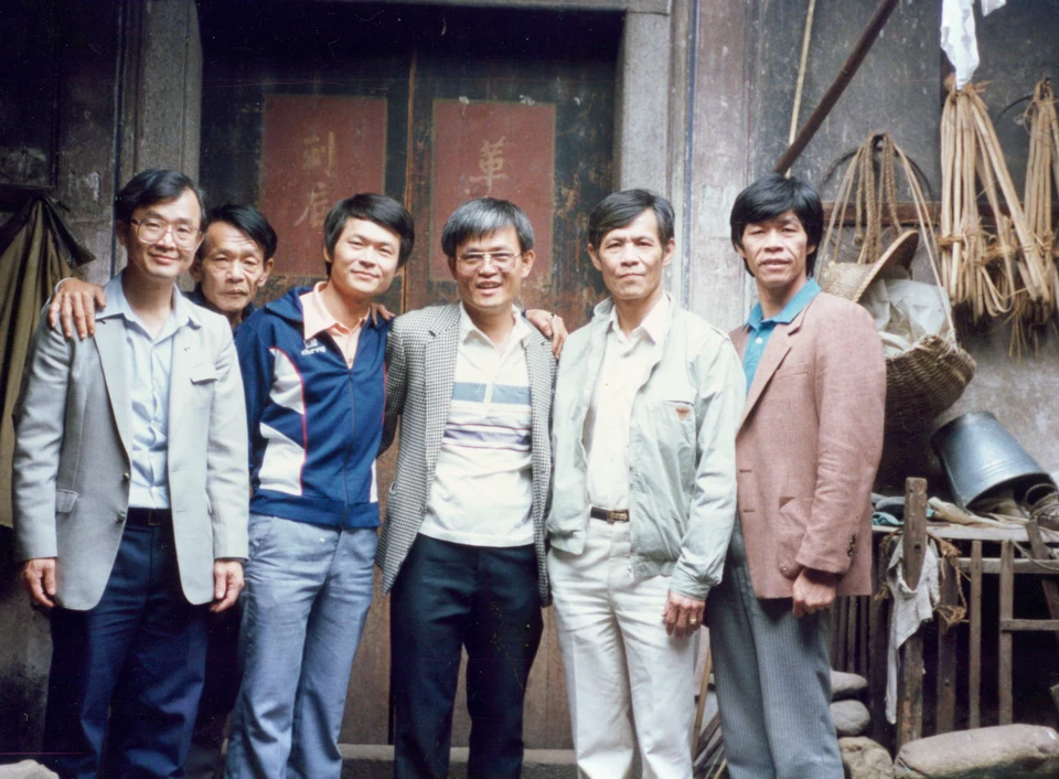 The brothers in their home village, 1988. From left: Gabriel, the sixth; the second brother; Jacob, the tenth; David; the fifth; and the ninth. Esther remembers this as their last reunion, on David’s final visit to the village.